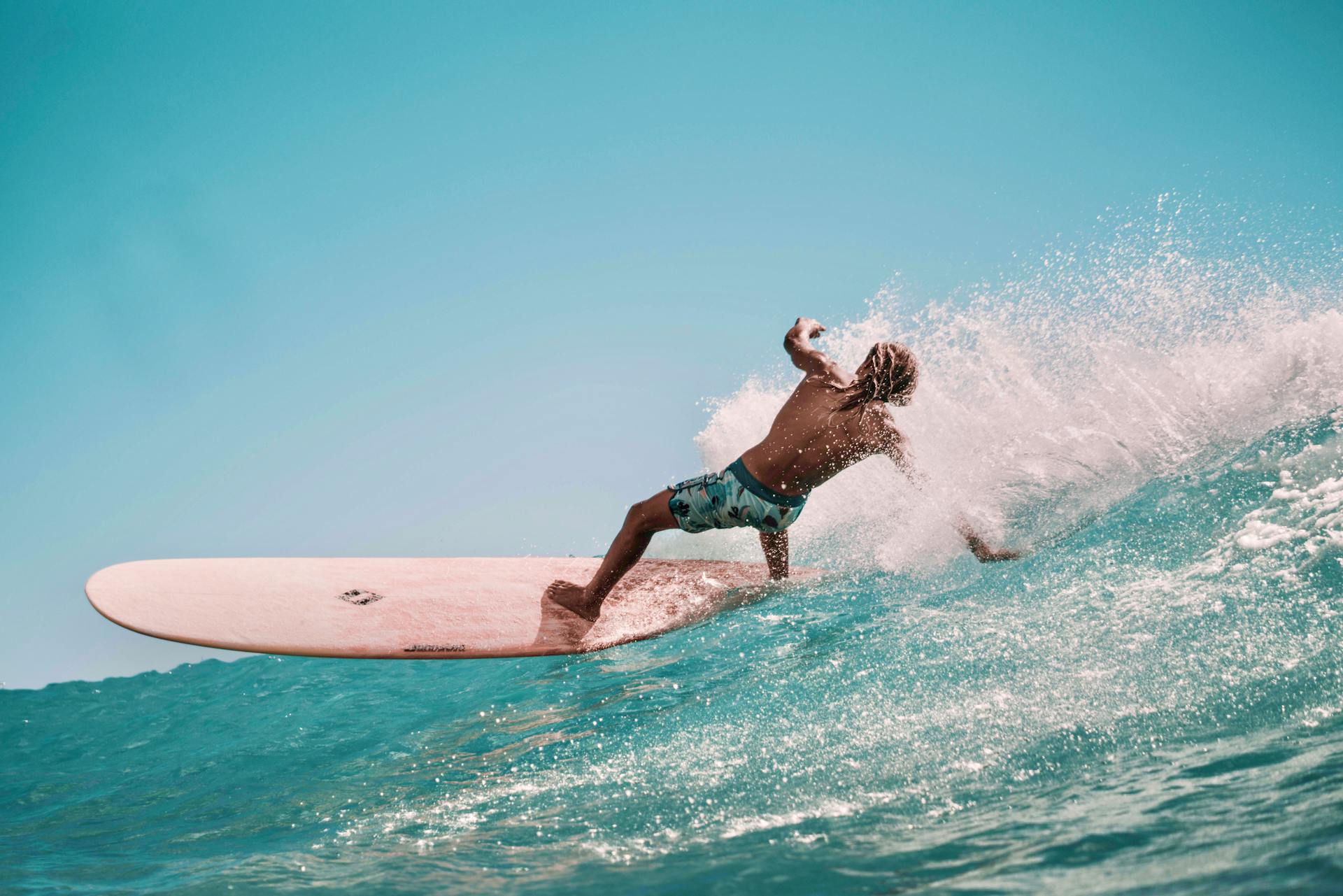 A man doing surf stunt