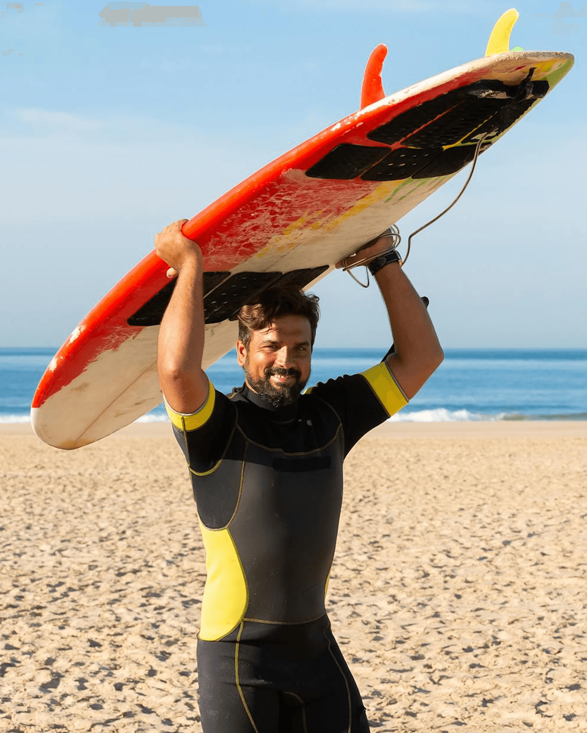 A man with surfboard