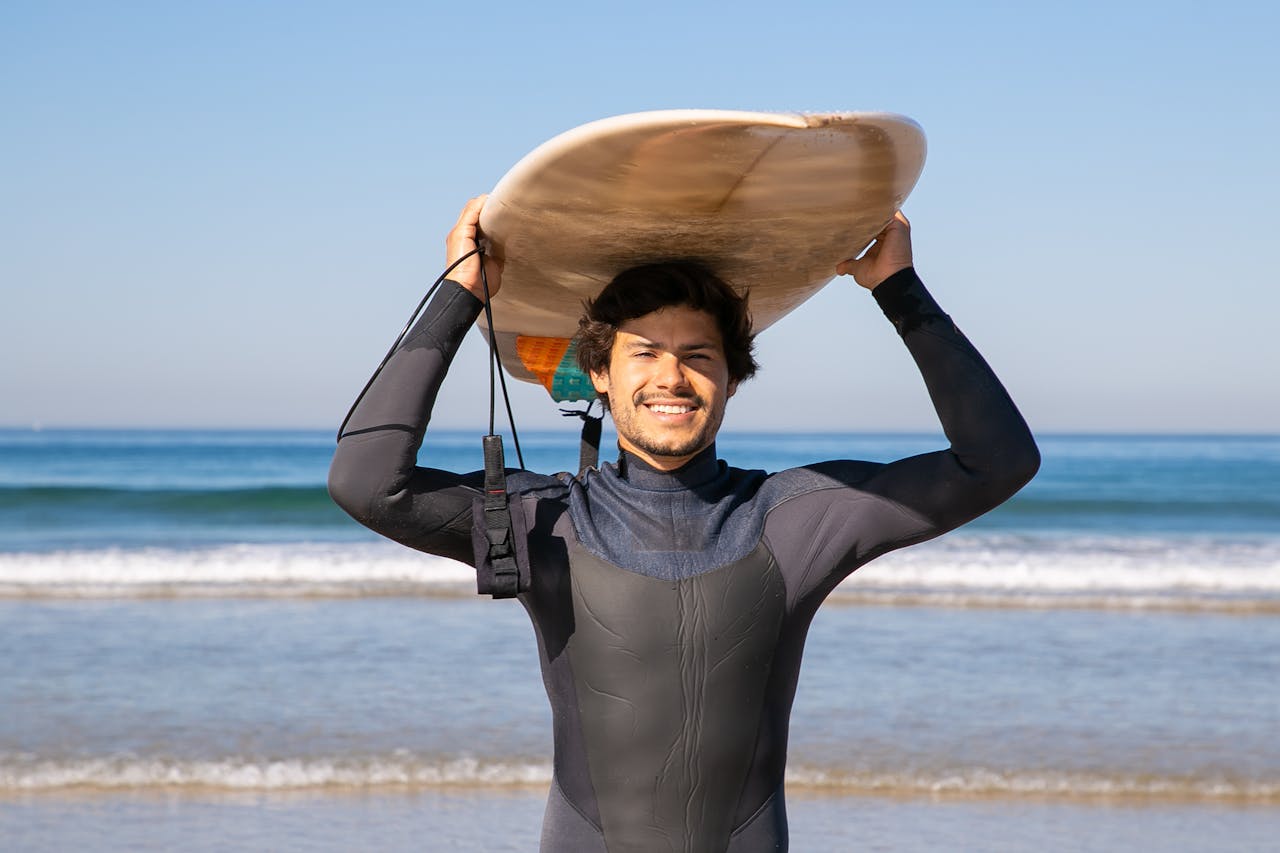 A man with surfboard
